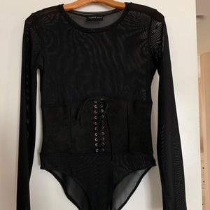Sheer black body suit from mustard seed
